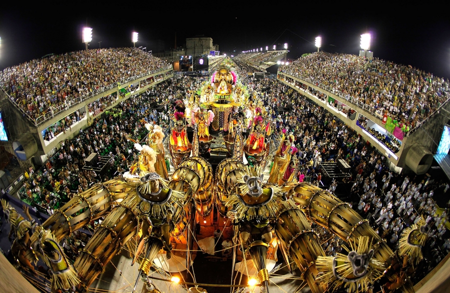 Revellers attend to XXXXXXXX Samba School parade during Rio de Janeiro's carnival on Marques de Sapucai Sambodromo.