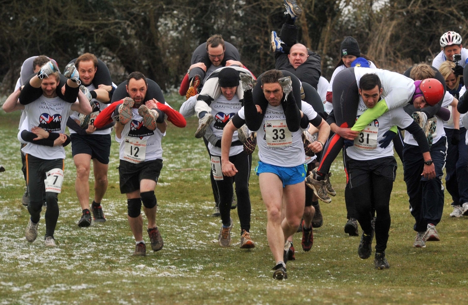 22/03/13. METRO FEATURES : UK WIFE CARRYING CHAMPIONSHIPS. METRO JOURNALIST TOBIAS MEWS & PARTNER ZAYNE PARTICIPATE IN THE UK WIFE CARRYING CHAMPIONSHIPS IN DORKING, SURREY. CREDIT: DANIEL LYNCH. 07941 594 556. www.lynchpix.co.uk