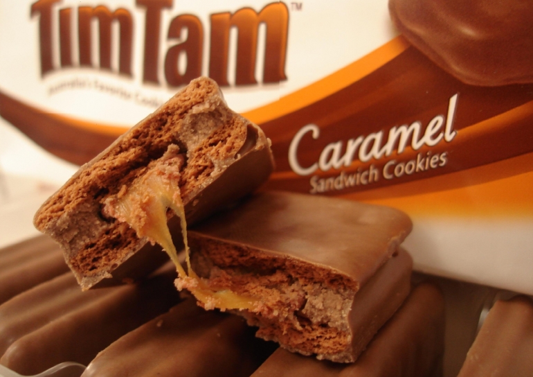 Tim Tams are chocolate covered caramel filled biscuits made in Australia Tim Tams are chocolate covered caramel filled biscuits made in Australia