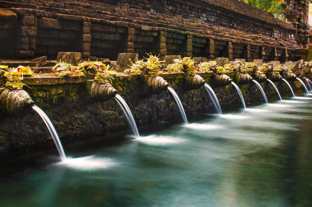 Rituals at Tirta Empul Temple for soul purification