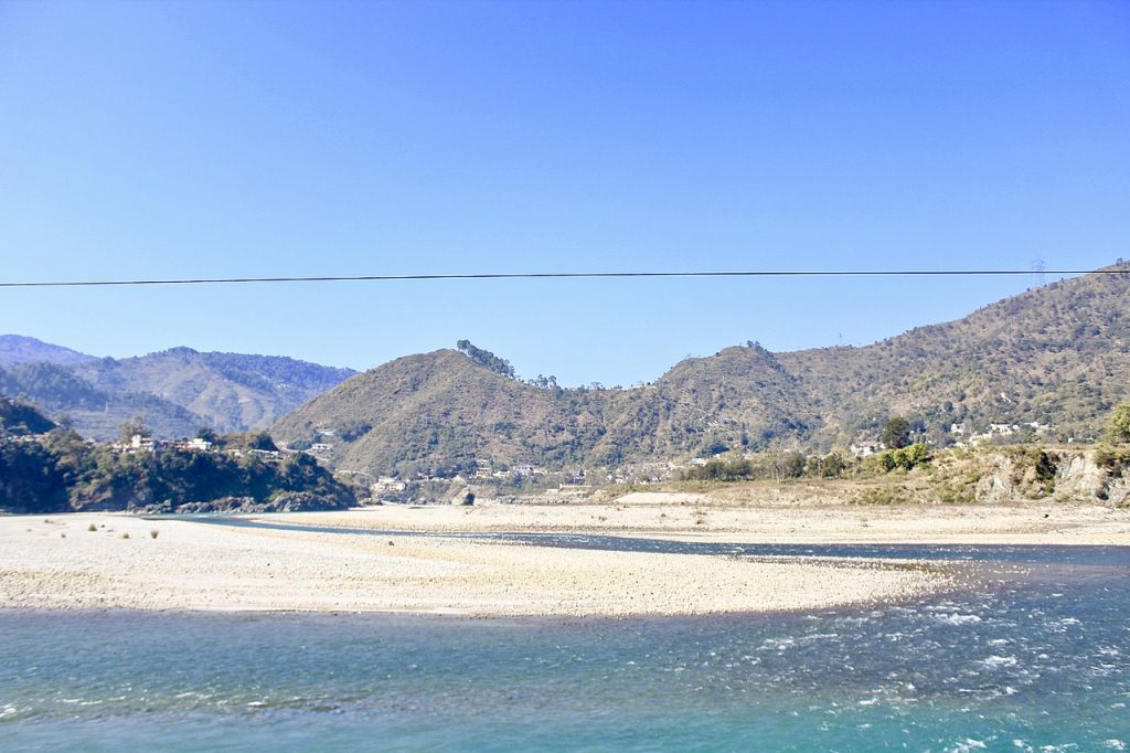 An idyllic river on the way to Lohajung one of the offbeat places to visit in Uttarakhand
