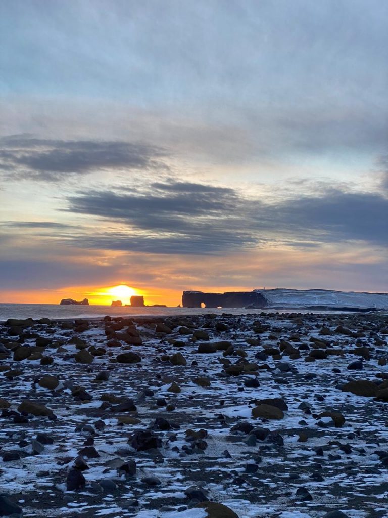 Sunrise at the black sand beaches Vik in Iceland with my loved one