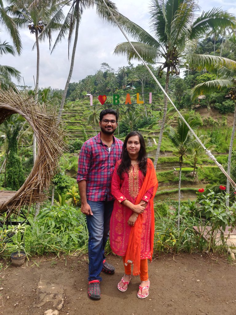 A couple posing in the Tegalallalang on their first international trip to Bali
