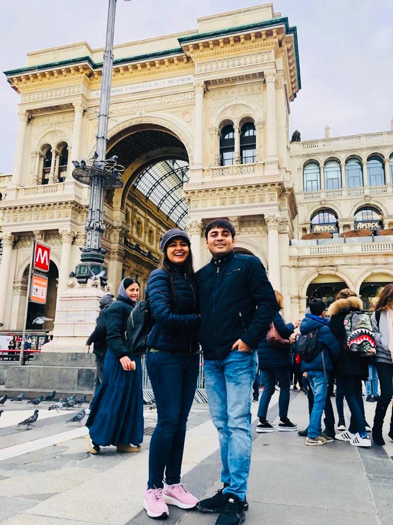 Couple at a famous mall in Galleria Vittorio in their honeymoon trip