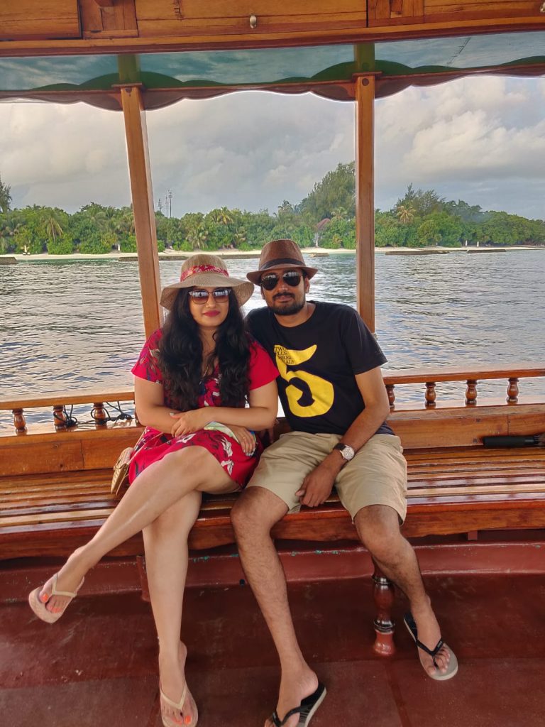 enjoying the boat ride on our trip to Maldives