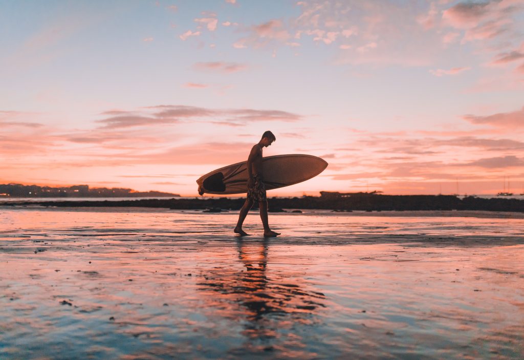 Surfing at Manly beach