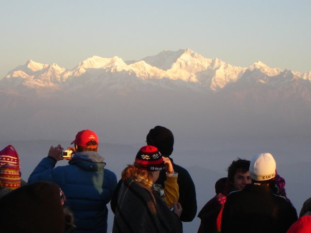 A picture of a group of tourists showing the strength of tourism in Darjeeling