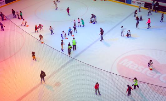 Visitors are skating in Ice Rink