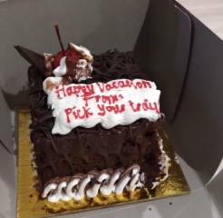 A picture of a cake on their honeymoon vacation to Bali