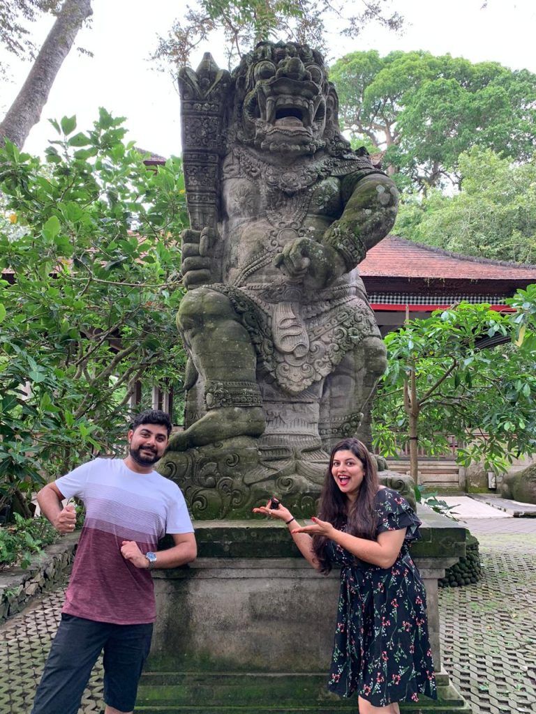 A couple posing in one of the temples in Bali