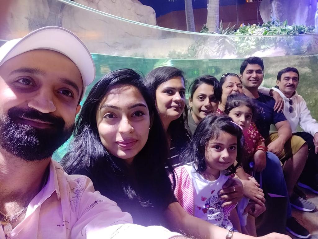 A group of people who went on a family trip to Dubai posing for a picture