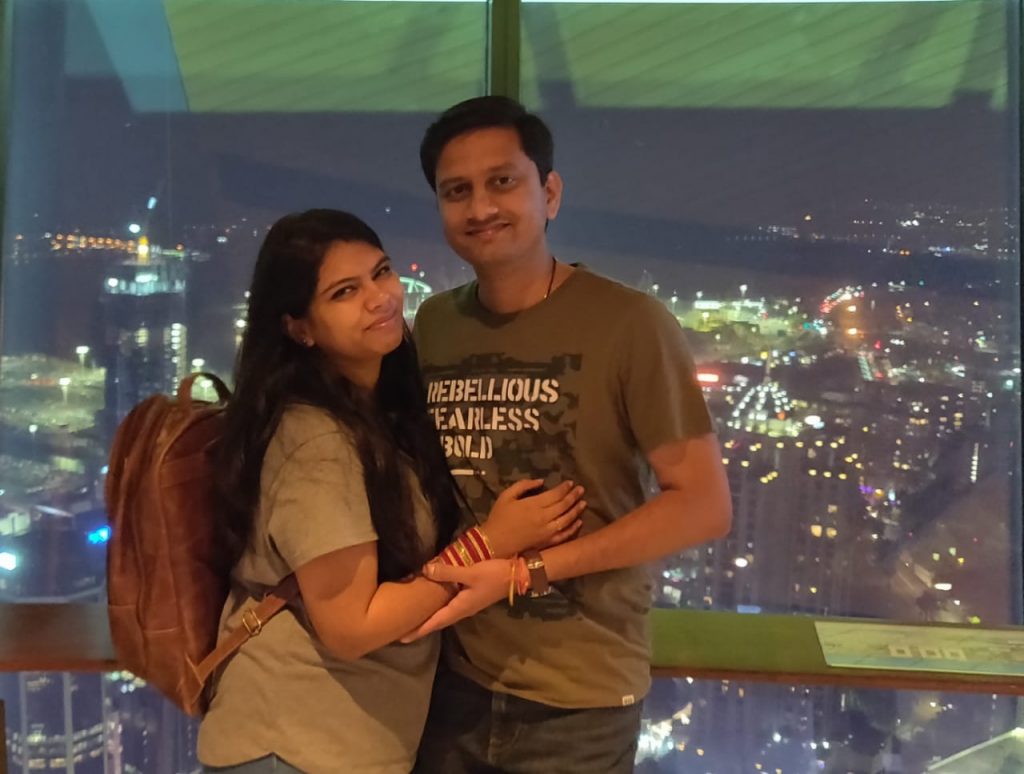 A picture of a couple posing on their honeymoon vacation to New Zealand