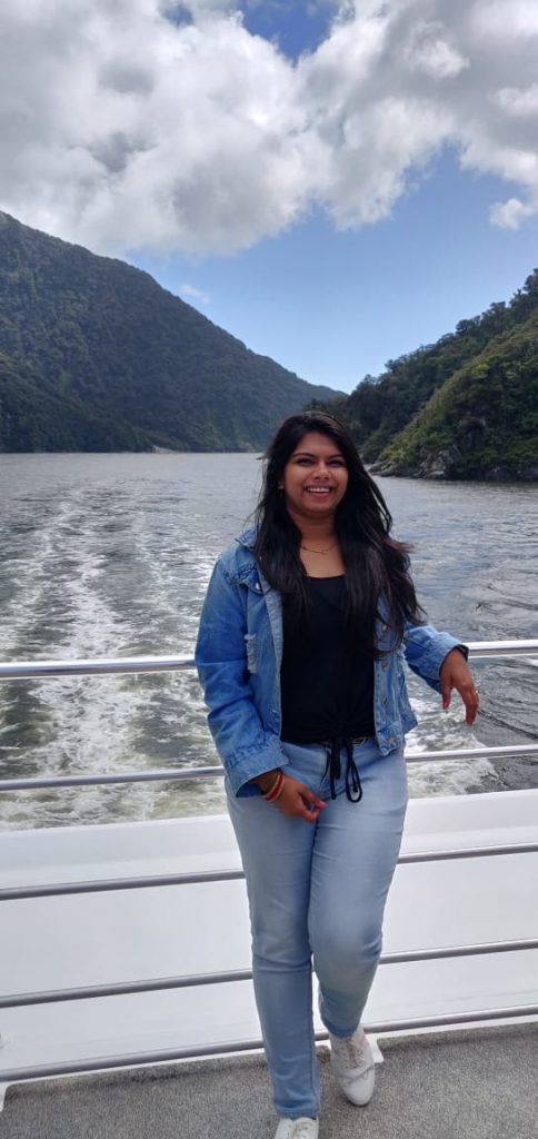 A picture of a woman posing on her honeymoon vacation to New Zealand