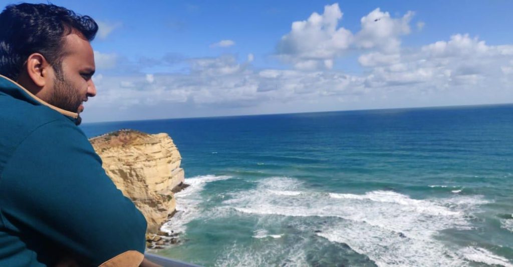 A picture of a man at one of the beaches in Australia