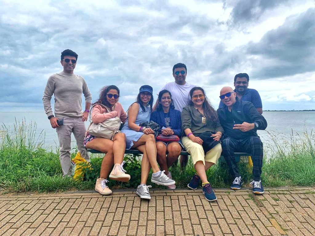 A picture of a group of 8 friends, that was taken in Europe