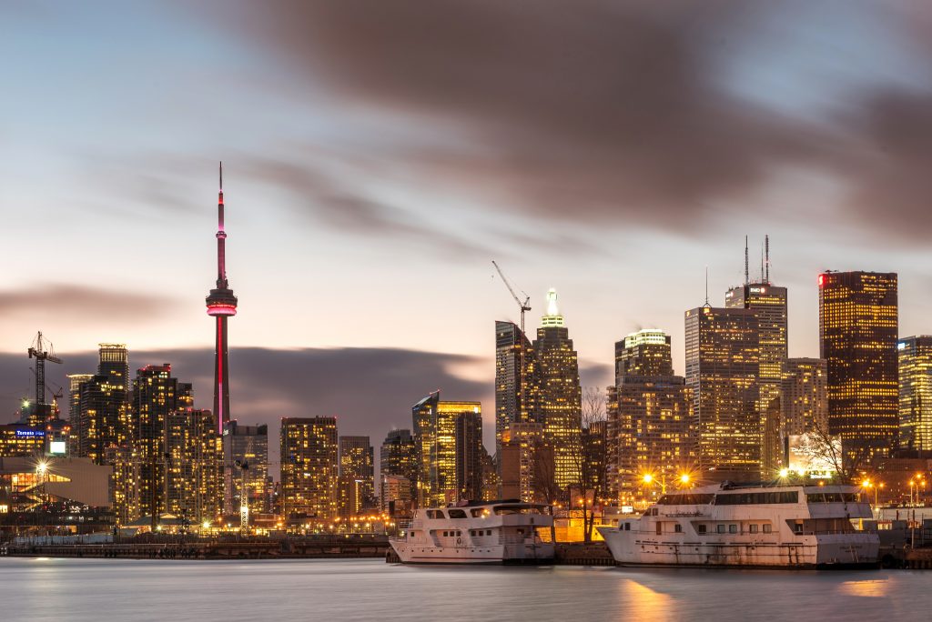 A picture of buildings lit up with lights in Toronto in Canada
