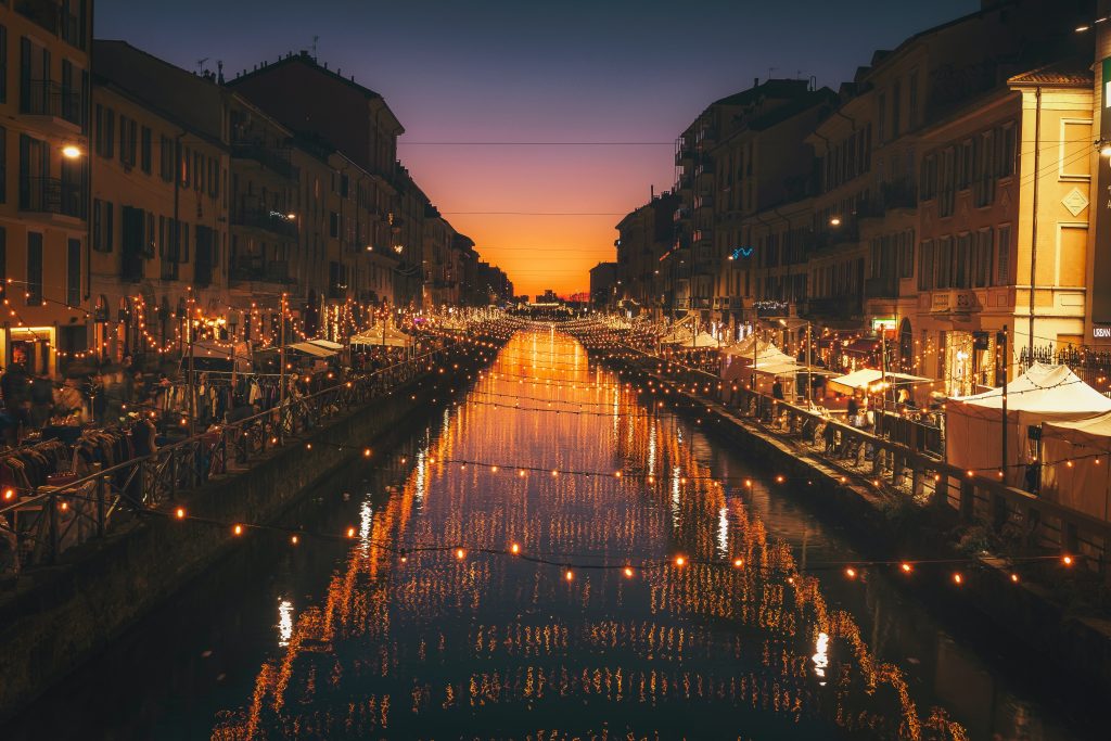 A picture of the city of Milan beautifully decorated with lights