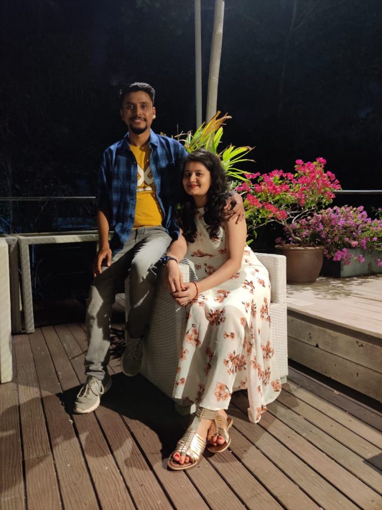 A couple posing for a picture