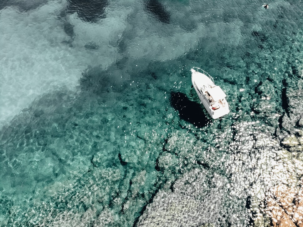 a ferry floating in the sea