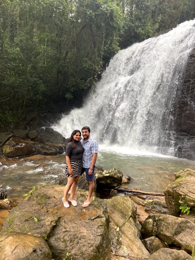Posing before the waterfalls
