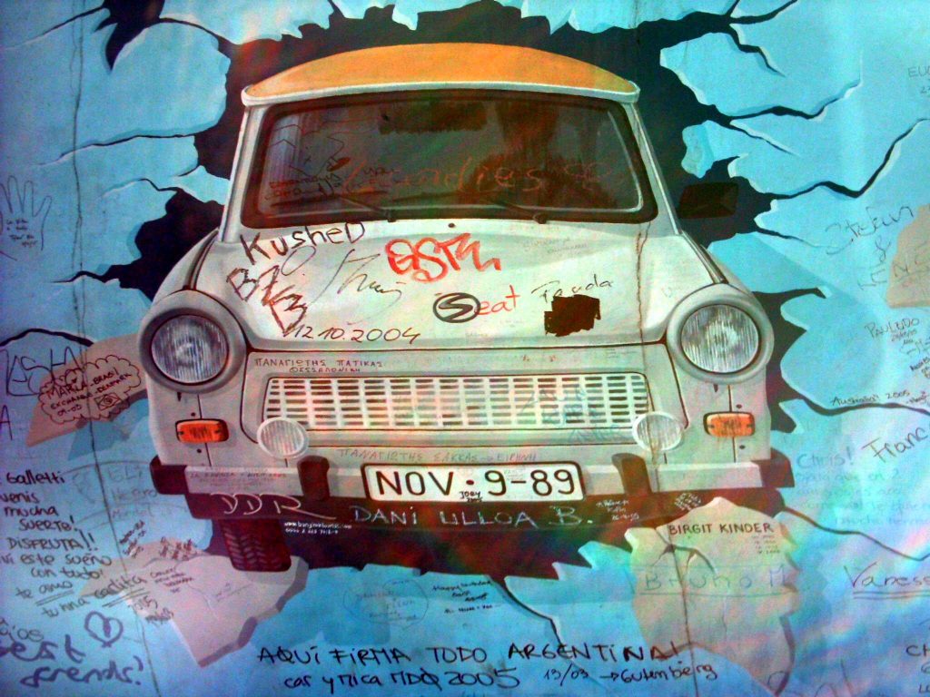 Trabi breaking through the wall, Berlin.