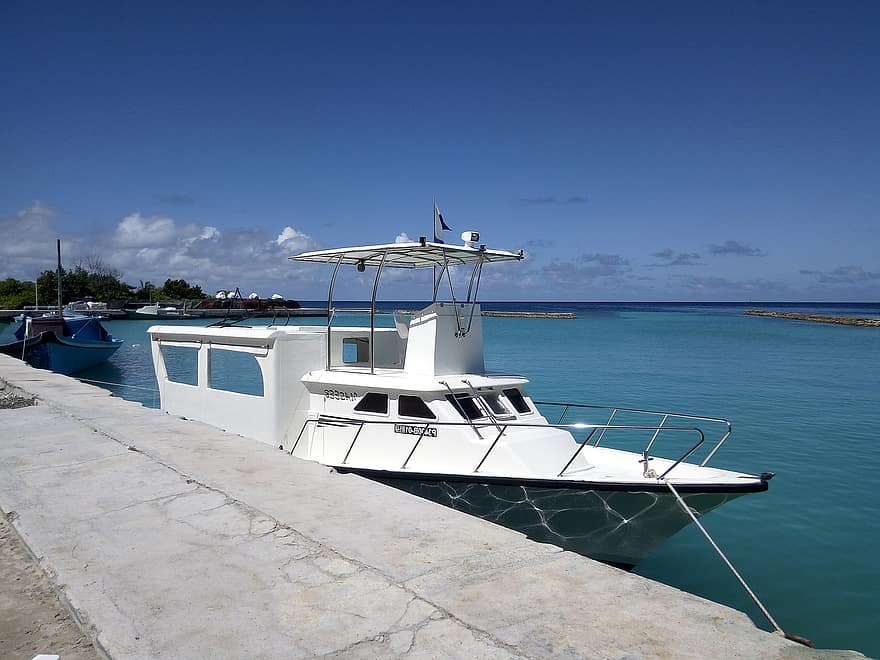 Speedboat docked in the port.