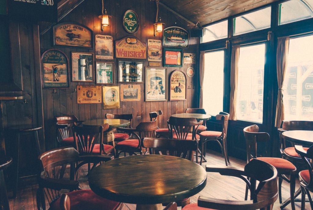 A bar with wooden furniture