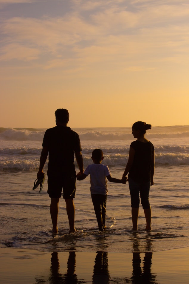 Family enjoying at Marari beach in Kerala