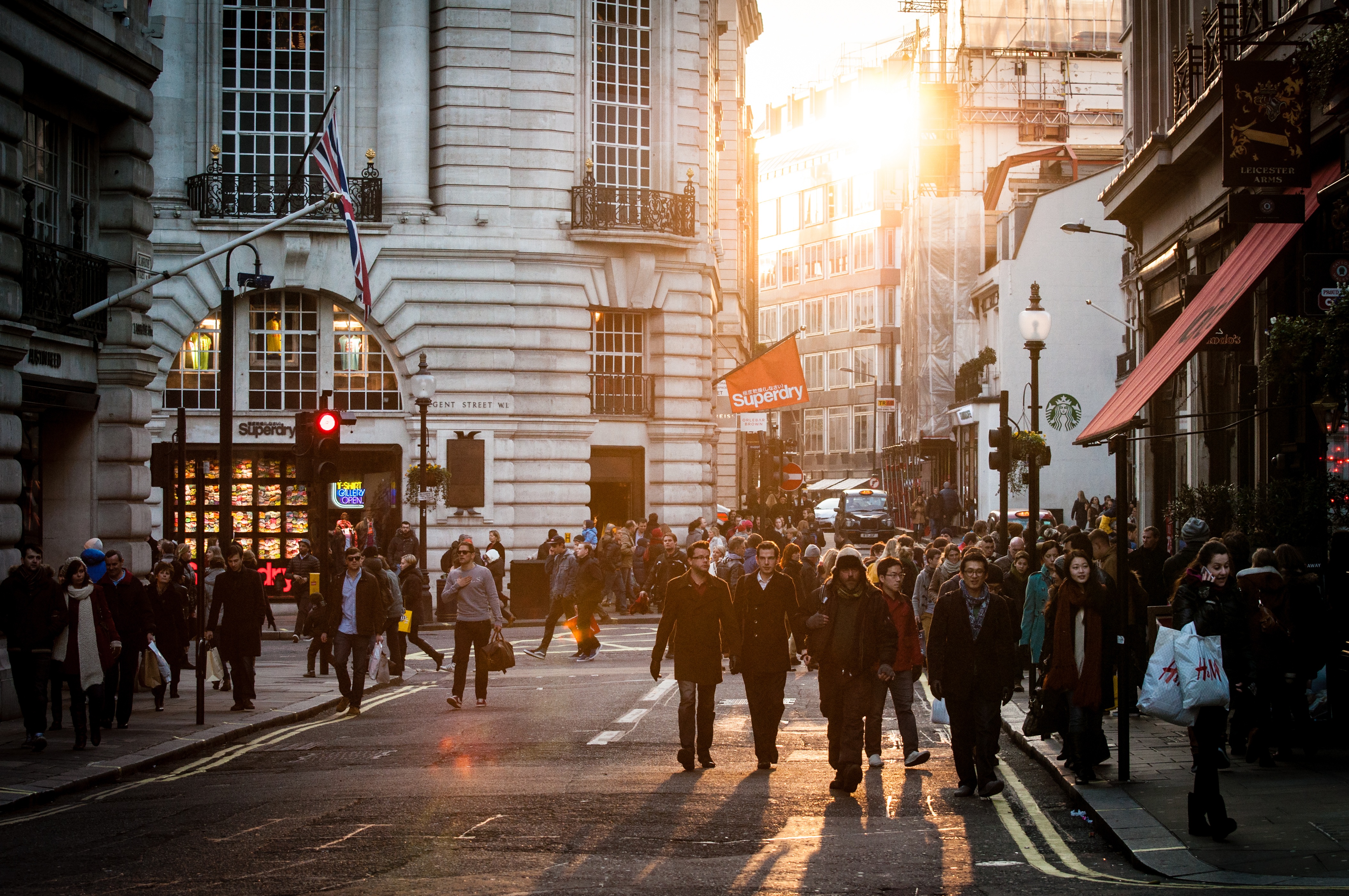 Europe crowded city street, Travel to Europe on a budget